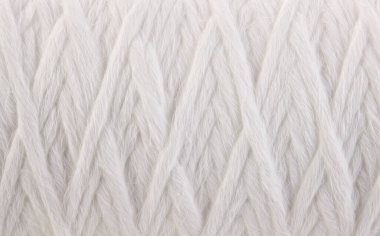 Roll of white rope water filter close up isolated on white background