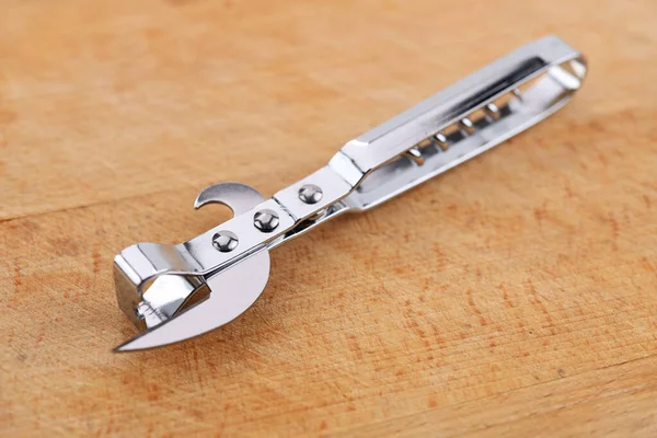 Can Opener Wooden Handle Wooden Background — Stockfoto