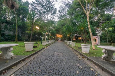 Santos, Brazil. June 5, 2022. Gardens of the Benedicto Calixto Art Gallery. Neoclassical mansion from the early 20th century. At the back, the Bistro Calixto restaurant.