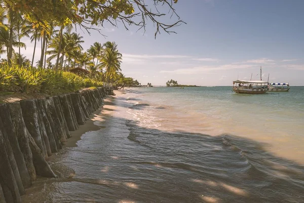 Morro de Sao Paulo, Bahia, Brazil. Natural landscape on the beach in the afternoon at high tide.
