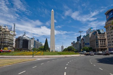Buenos Aires, Argentina. January 3, 2011: 9 july Avenue , one of the widest in the world and the Obelisk in Republic Square. 