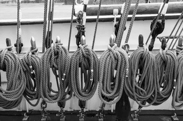 Sailboat sail ropes. Naval ropes. Black and white image.