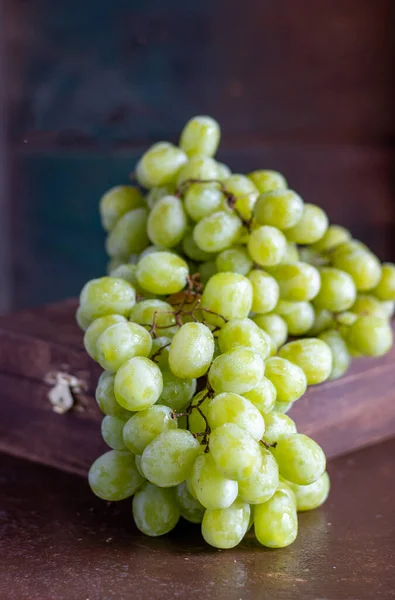 green  Grapes on top of the box