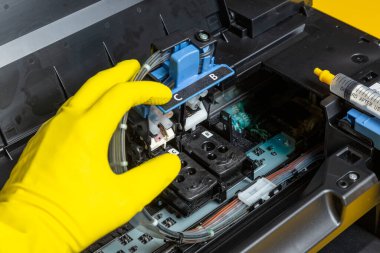 Recover a Dry Printer Head with cleaner and a syringe