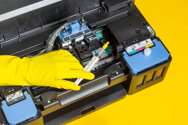 Recover a Dry Printer Head with cleaner and a syringe
