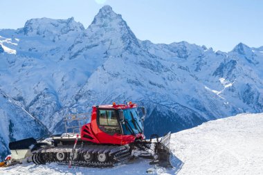 snow-sealing machine, all-terrain vehicle, Dombai ski resort, Western Caucasus, Karachai-Cherkess, Russia-March 5, 2021.
