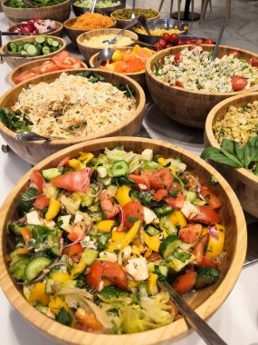 Choice of salads, buffet. Large selection of dishes in the restaurant, salads, meat barbecue, cake