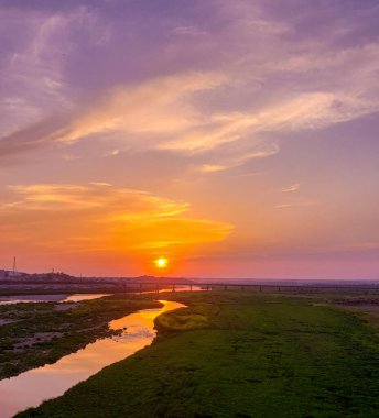 Sun setting on the Indus river