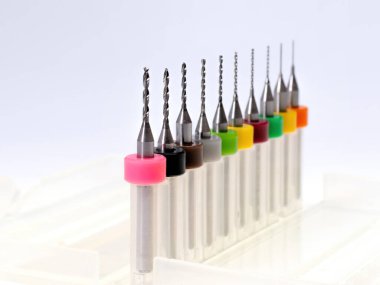 Set of micro drill bits, color coded in plastic box. For drilling mechanics electronics, pcb etc.