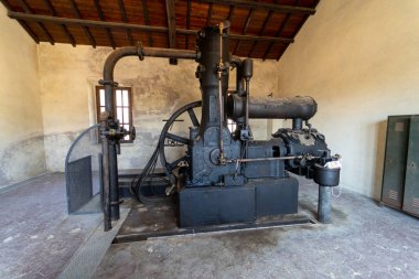 Old abandoned mine of montevecchio in Guspini and Arbus, industrial archeology, guided tours of the mines, cultural heritage, mining equipment, ancient hydraulic pumps and elevators