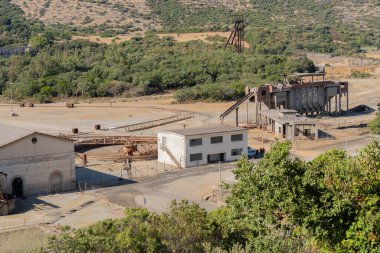 Old abandoned mine of montevecchio in Guspini and Arbus, industrial archeology, guided tours of the mines, cultural heritage, mining equipment, ancient hydraulic pumps and elevators