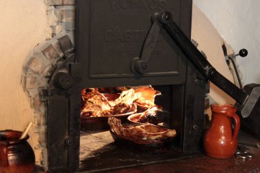 Roast suckling lamb baked in a traditional oven