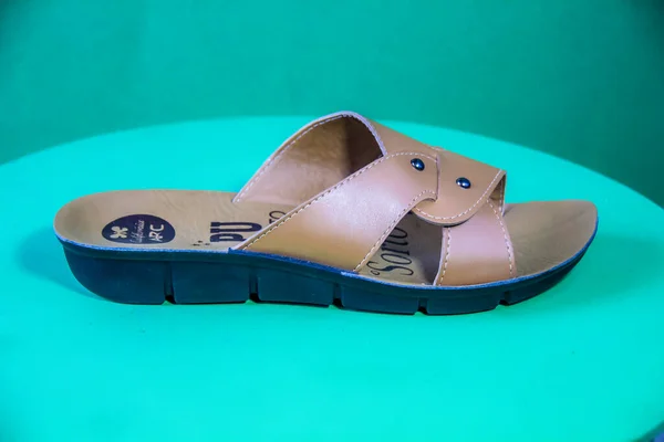 Illustrative Editorial Branded Photography Slipper Shouted Green Background Shot Selective — ストック写真