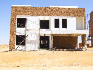 Editorial construction Photo, shot is selective focus with shallow depth of field. Photo taken at Cairo Egypt on 13 May 2010