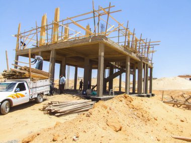 Editorial construction Photo, shot is selective focus with shallow depth of field. Photo taken at Cairo Egypt on 13 May 2010