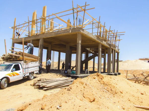 Editorial construction Photo, shot is selective focus with shallow depth of field. Photo taken at Cairo Egypt on 13 May 2010