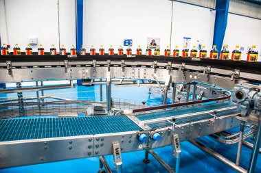 Big Cola factory, manufacture steps, shot is selective focus with shallow depth of field. Photos taken at Cairo Egypt on 21 January 2016