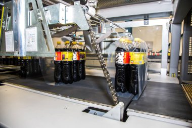 Big Cola factory, manufacture steps, shot is selective focus with shallow depth of field. Photos taken at Cairo Egypt on 21 January 2016