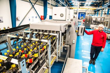 Big Cola factory, manufacture steps, shot is selective focus with shallow depth of field. Photos taken at Cairo Egypt on 21 January 2016
