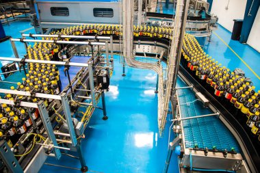 Big Cola factory, manufacture steps, shot is selective focus with shallow depth of field. Photos taken at Cairo Egypt on 21 January 2016