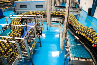 Big Cola factory, manufacture steps, shot is selective focus with shallow depth of field. Photos taken at Cairo Egypt on 21 January 2016