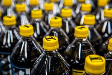 Big Cola factory, manufacture steps, shot is selective focus with shallow depth of field. Photos taken at Cairo Egypt on 21 January 2016