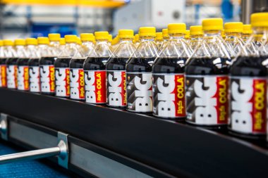 Big Cola factory, manufacture steps, shot is selective focus with shallow depth of field. Photos taken at Cairo Egypt on 21 January 2016