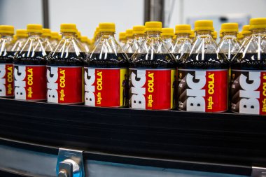 Big Cola factory, manufacture steps, shot is selective focus with shallow depth of field. Photos taken at Cairo Egypt on 21 January 2016