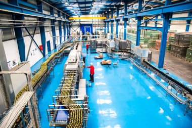 Big Cola factory, manufacture steps, shot is selective focus with shallow depth of field. Photos taken at Cairo Egypt on 21 January 2016