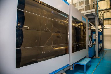 Big Cola factory, manufacture steps, shot is selective focus with shallow depth of field. Photos taken at Cairo Egypt on 21 January 2016