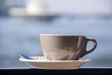 Cup of Coffee Nile view, shot is selective focus with shallow depth of field. Photos taken at Cairo Egypt