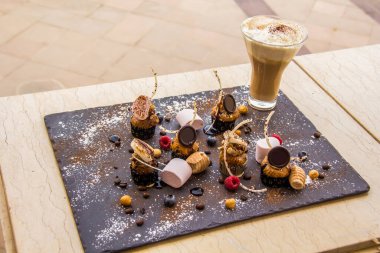 Coffee day shot and coffee maker, Photo is selective focus with shallow depth of field. Taken at Cairo Egypt on 27 September 2017.