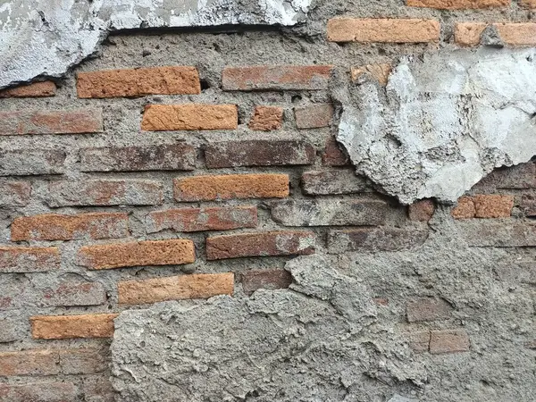 the walls of the old house that have been destroyed and damaged