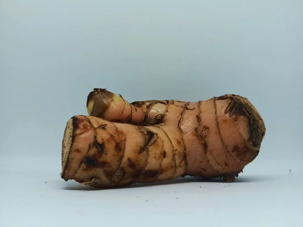 close up of old white turmeric. for cooking spiceson a white background