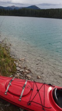 ready to kayak over the clear water