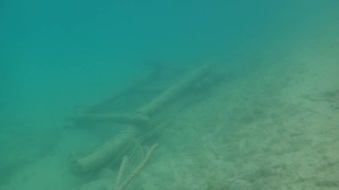 cabin or dock wreck under water fresh water dive