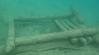 cabin or dock wreck under water fresh water dive