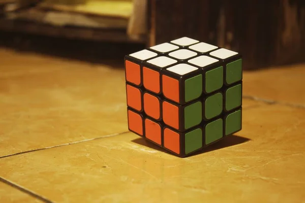 wooden cube with a rubik
