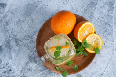 ice orange mojito style beverage