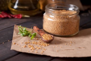 mustard. dark style. selective focus