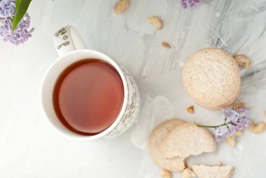 biscuits and a cup of tea. selective focus