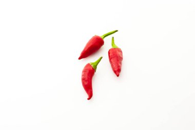 chilli peppers on white background. selective focus