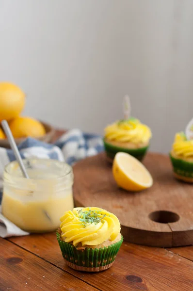 Lemon Homemade Cupcake Yellow Whipped Cream Wooden Table — Zdjęcie stockowe