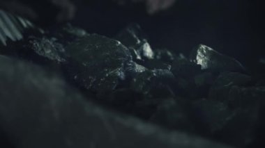 Ore close-up. Mining ore from the underground. Dynamic handheld shot. 4K