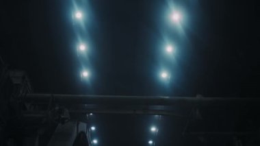 Ore processing plant. The crushing drum is spinning. Filming inside the beautiful plant. Production of heavy metals. Vertical panorama. 4K
