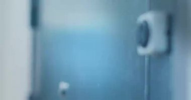 A man's hand knocks on the metal door and freezes. Close-up. Side view.The supplier will bring the order. Home delivery.4K