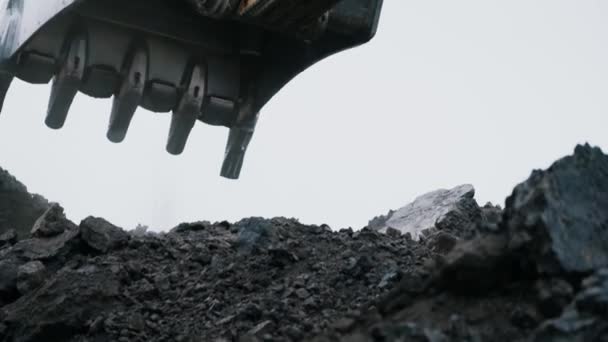 Excavator Bucket Slowly Picks Large Handful Rocks Soil Carries Body — Stock Video