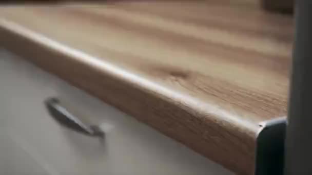 Close Kitchen Wooden Countertop Black Electric Cooktop Chrome Sink Faucet — Stock videók