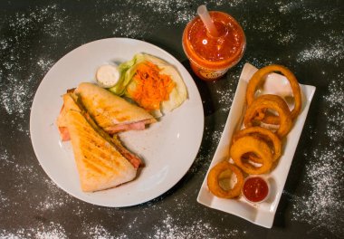 onion rings served with tomato sauce