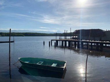beautiful sunset in the salvadorian pacific ocean. dock